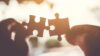 Jigsaw pieces connecting in a similar way to solicitors collaborating estate agents