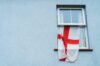 An England flag being displayed out of a house window
